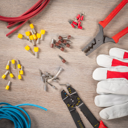 Assortment of electrical equipment and tools with open space for customized text