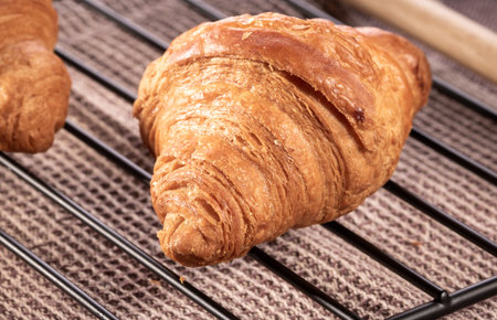 Croissant on the kitchen table, top view, close-up.の写真素材