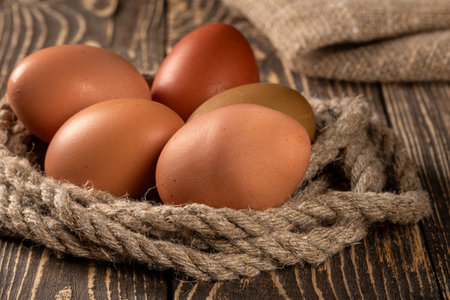 A delightful display of homegrown chicken eggs that are raised sustainably, elegantly presented on a...