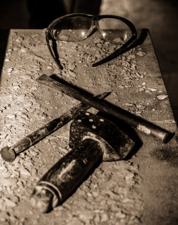 Old tools on the table. Selective focus. Toned.