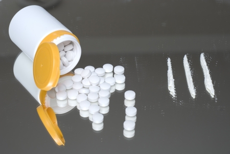 Drugs on a mirror. Mixed use of narcotics.の写真素材