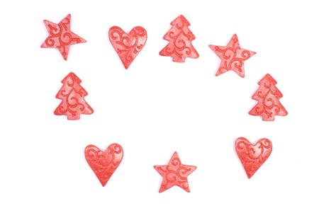 Red christmas trees, stars and hearts isolated on a white background.の写真素材