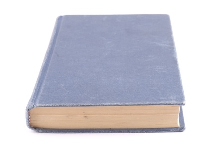 Old blue book isolated on white. Biblical composition.の写真素材