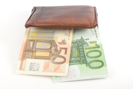Thick wallet and euro banknotes. Isolated on white.の写真素材