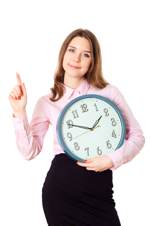 Woman is holding in hands clock.Human emotions.の写真素材