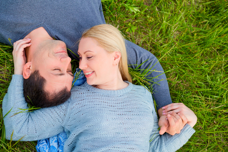 Happy coulpe on the grass.Love.の写真素材