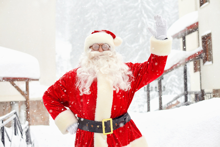 Santa Claus on snow in winter at Christmas.の写真素材