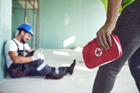 Construction worker accident with a construction worker. First aid for injury at work.の写真素材