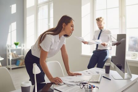 Businesswoman confident working in a white office. Businesspeople work startup business project merge business meeting in a modern business center.の写真素材