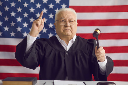 Stern American judge finds the accused guilty, passes judgment and rules the case closed. Serious...