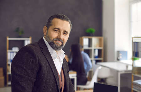 Portrait of a good-looking senior business executive and professional entrepreneur. Handsome mature...