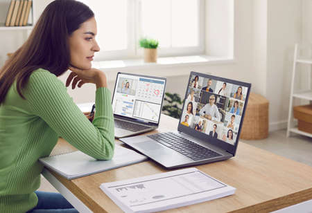 Team of colleagues who are working from home in lockdown create online network, meet and discuss...