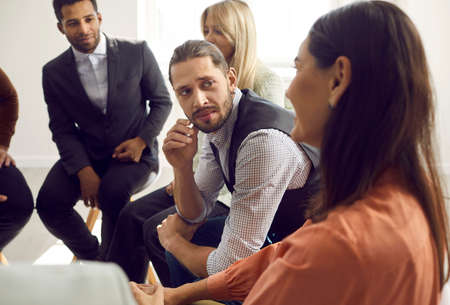 Diverse team of people talking during a meeting. Group of mixed race multi ethnic men and women...