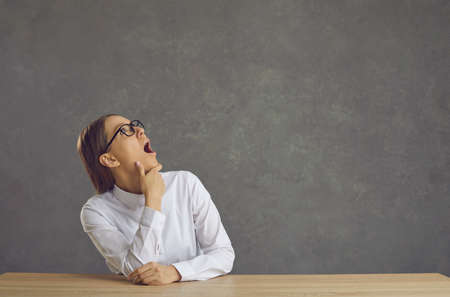 Young woman with great surprise on her face is stunned by a thought or idea that came to her mind....