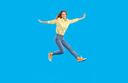 Full length body size view of nice attractive lovely glad cheerful wavy-haired woman raising hands...