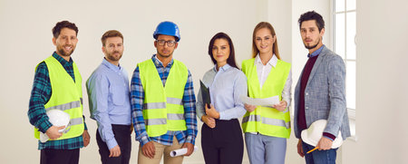 Portrait of a happy team of diversity multiethnic architects, engineers, interior designers and...