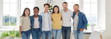Group portrait of creative, smart and cheerful startup coworkers who are smiling at camera....