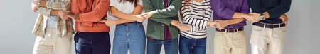 Cropped photo of young people friends students or company employees men and women wearing casual...