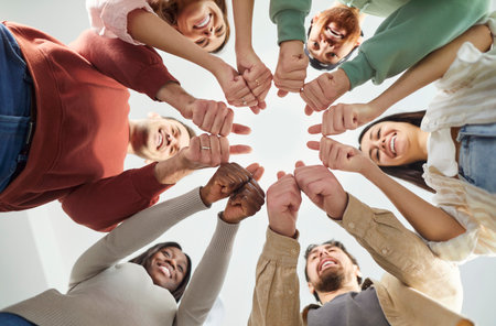 Friends group circle, satisfaction, approval, diverse people holding hands at therapy session, team together, psychological support, training understanding, corporate unity connection, teambuildingの写真素材