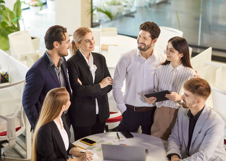 Office group, team of professionals, business people negotiating in modern boardroom, discussing project, planning contract terms and conditions, solve business problems during formal meetingの写真素材