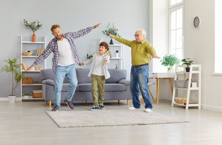 Happy three generation men, grandfather, father, son at home have fun play, cute excited dad...