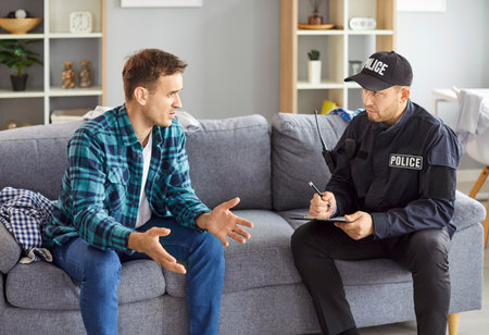 Policeman interrogating at home, officer police man in uniform, witness interview, interviewing...