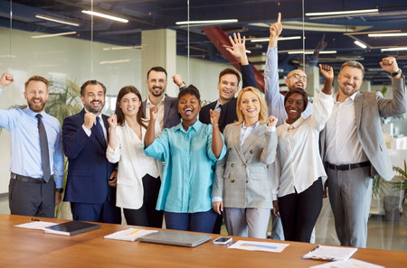 Corporate portrait of overjoyed diverse office employees workers show to recommend good quality...