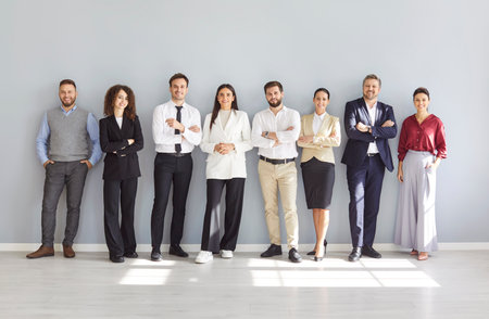 Diverse office people standing in row, smiling, waiting for meeting, potential employers hiring,...