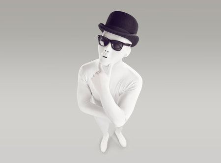 Hmm, well, let me think. Unusual incognito adult young man wearing white bodysuit costume,...