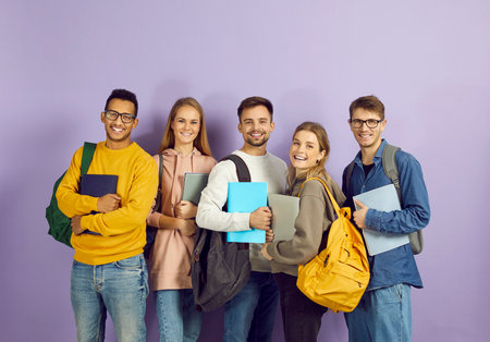 Diverse group of happy university or college students. Cheerful smiling multiethnic young friends in...