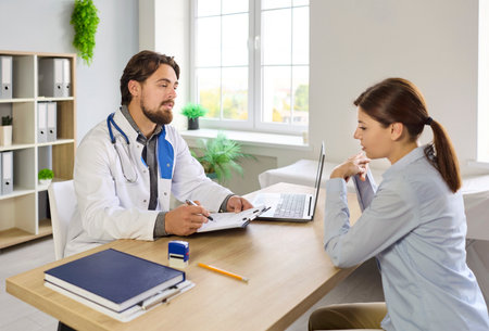 Doctor and patient meeting in hospital for professional consultation, disease prevention....