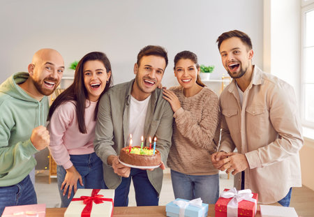 Happy birthday candle cake celebration, friendly group, family portrait, young friends party...