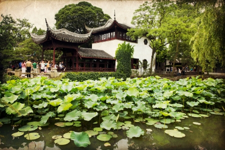 Chinese classical garden with pavilions and pond in Suzhou, Chinaのeditorial素材