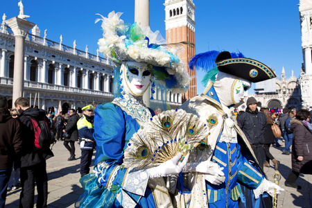 VENICE, ITALY, February 23, 2014: Carnival of Venice, beautiful masks at St. Mark's Squareのeditorial素材