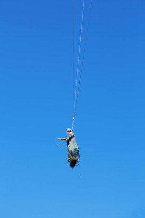 VENICE, ITALY, February 23, 2014: Flight of the dove from the bell tower of St. Mark's Square in Venice, opening of the Carnivalのeditorial素材