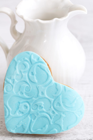 Shortbread cookies in the shape of heart decorated with sugar pasteの写真素材