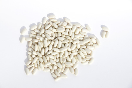 Beans on a white background, focus selected