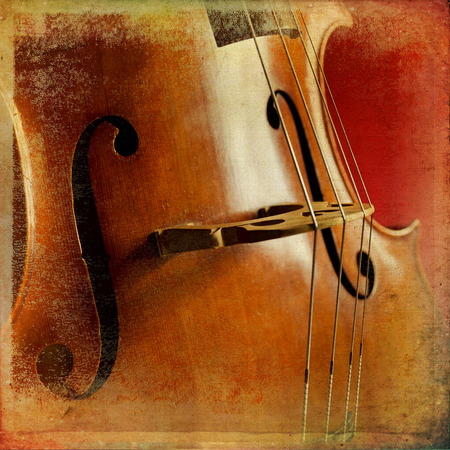 Close-up of double bass, wooden musical instrument that is played with a bowの写真素材