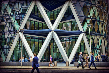 Businessmen outside the offices in the City of London