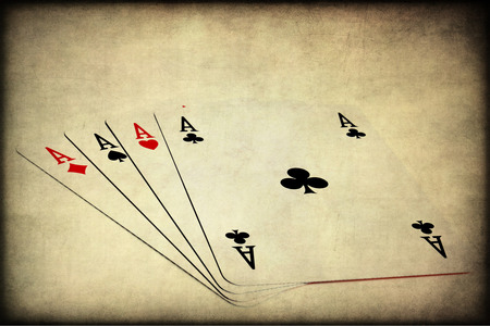 Playing cards on a white background. Poker of aces