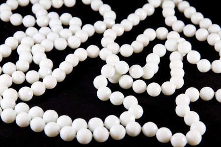 Necklace of pearls on black backgroundの写真素材