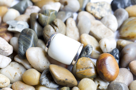 Gold Jewelry on a varievated stonesの写真素材