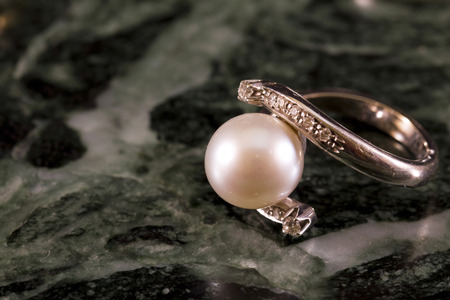 Precious ring with pearl and diamondsの写真素材