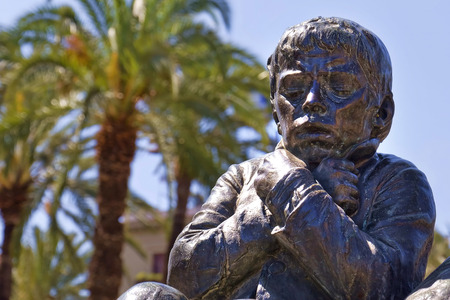 Palermo, Sicily. Child statue in bronzeの写真素材