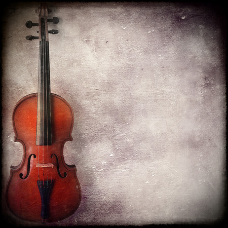 Violin on grunge background with spaceの写真素材