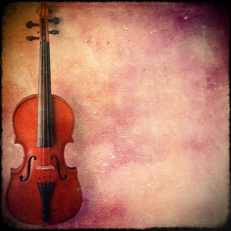 Violin on grunge background with spaceの写真素材