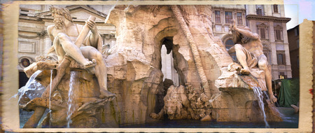 Fountain of the Four Rivers (Fontana dei Quattro Fiumi) with an Egyptian obelisk. Italy. Rome. Navon Square (Piazza Navona).の写真素材