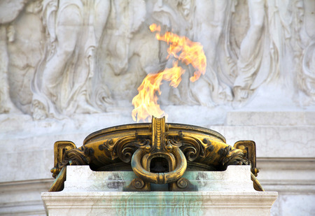 National monument to Vittorio Emanuele II (Victor Emmanuel II) or Altare della Patria (Altar of the Fatherland), Rome, Italy. Eternal flame of the Unknown Soldier in The Monument to the king Victor Emanuel IIのeditorial素材