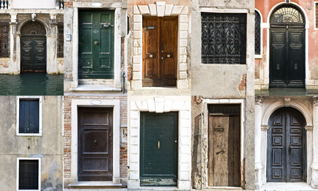 Typical  wooden door in an old wall in Venice, Italyの写真素材