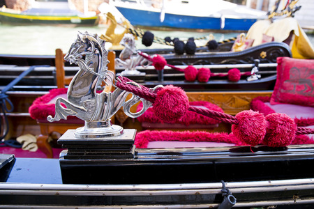 Venice - Rich decorations of the deck of a venetian gondolaの写真素材